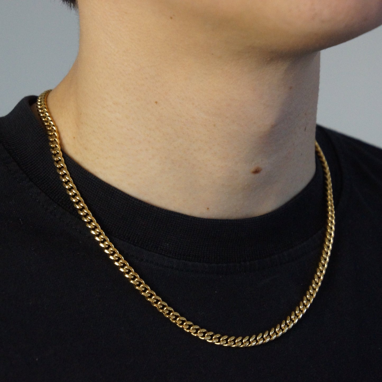 CLEAN CUBAN KETTING 5MM - 18K GOUD