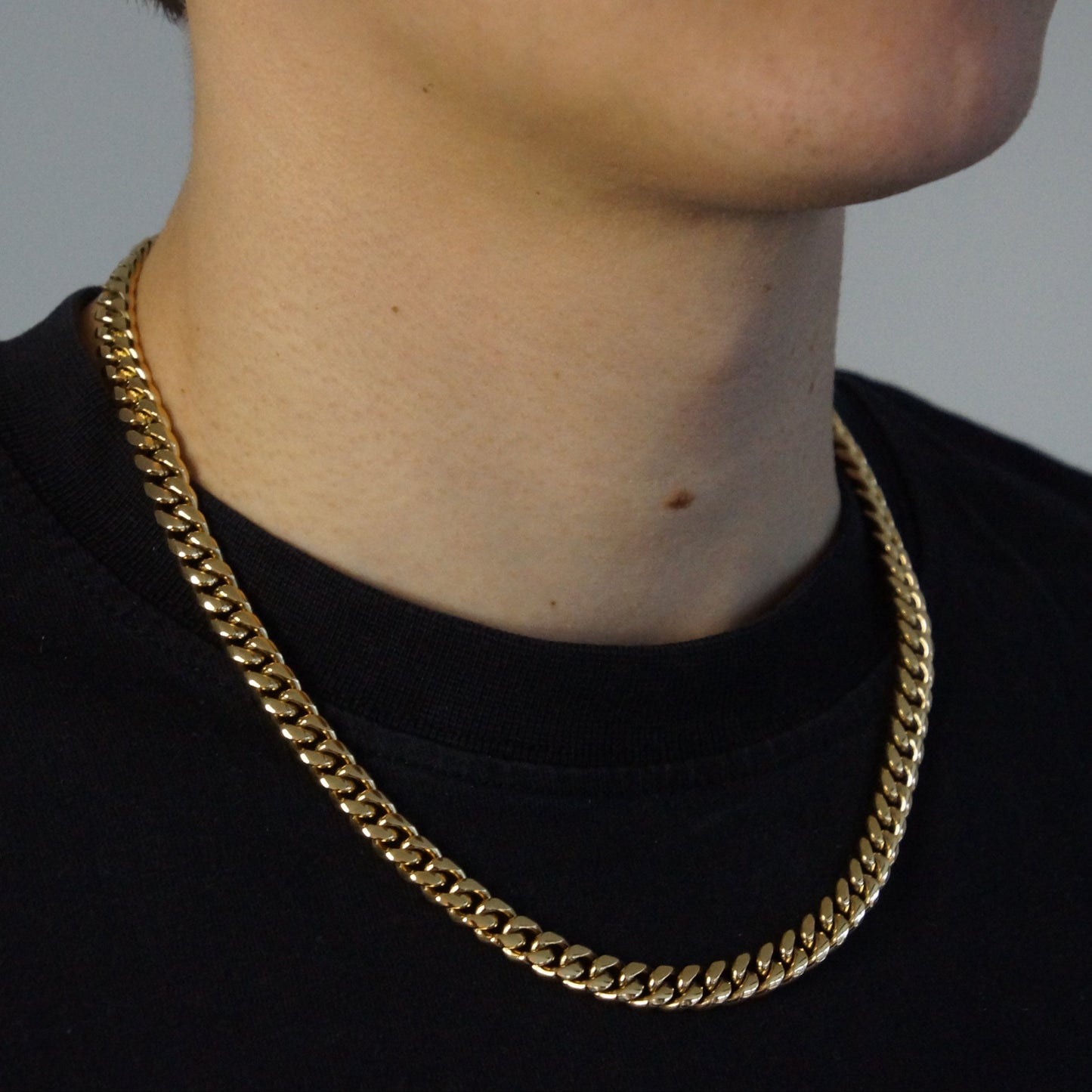 CLEAN CUBAN KETTING 8MM - 18K GOUD