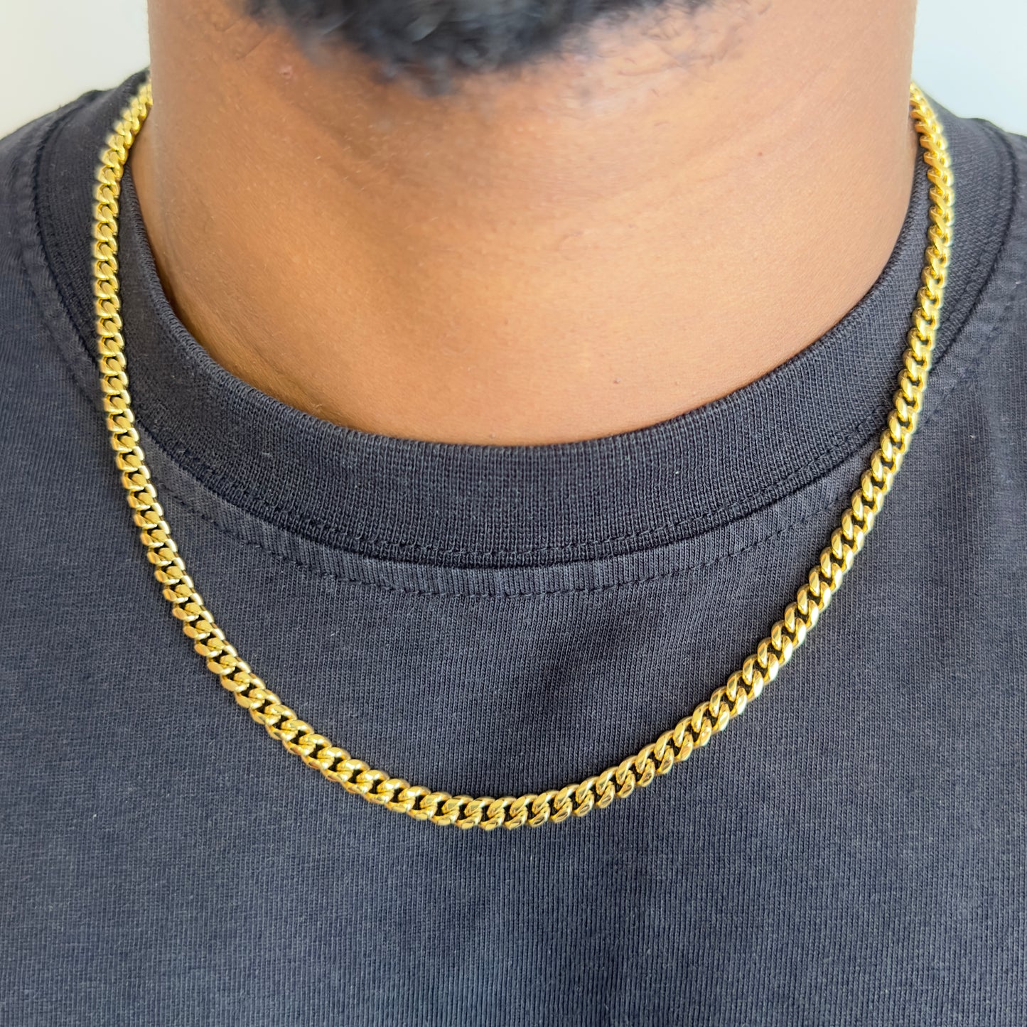 CLEAN CUBAN KETTING 5MM - 18K GOUD